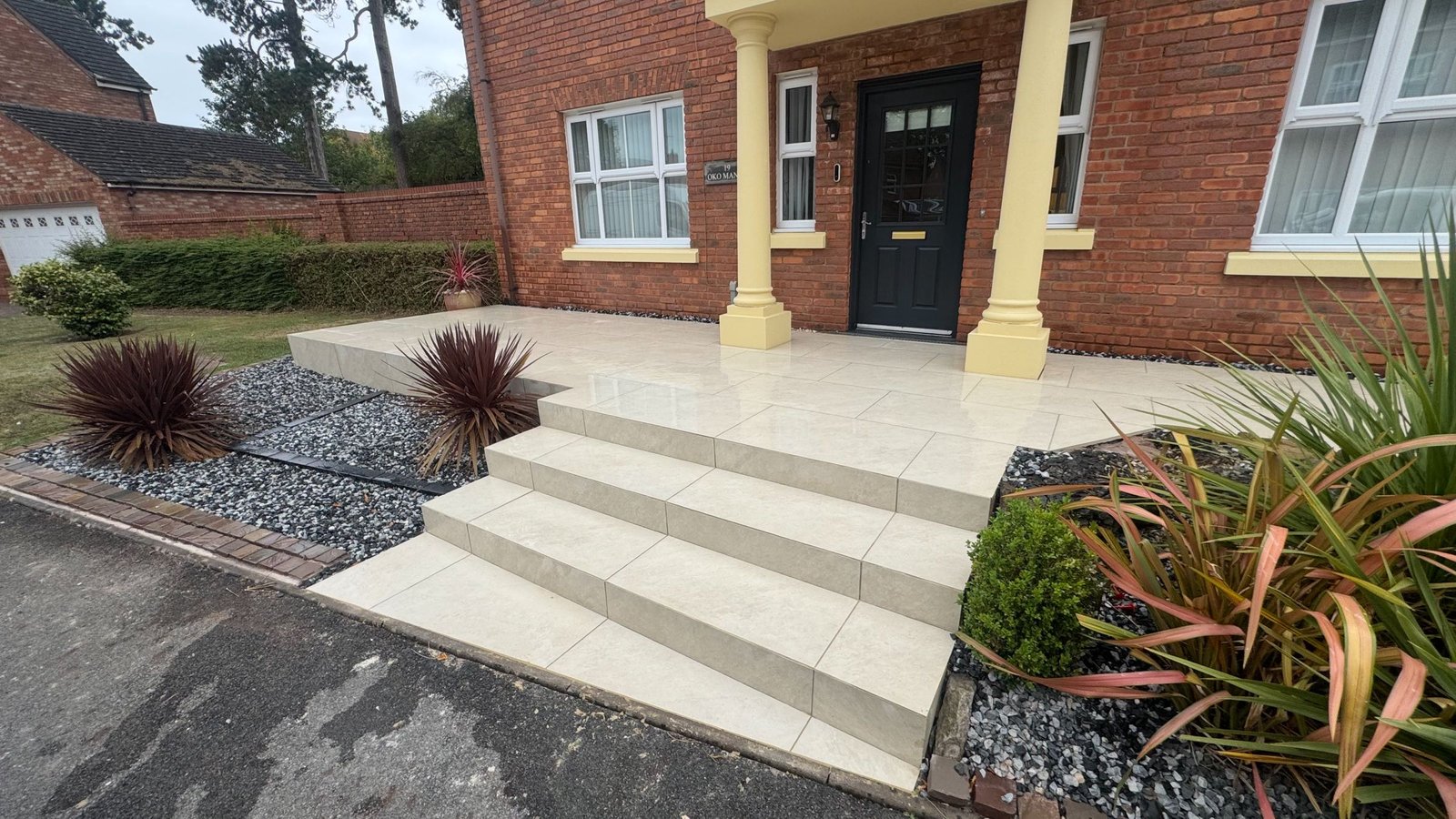 Front Porcelain Patio With Mitred Steps image 5