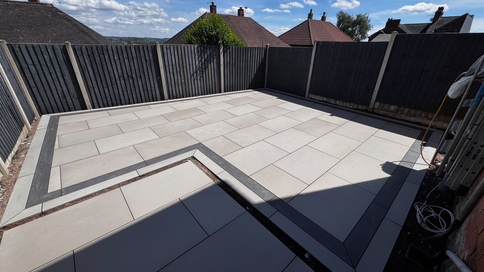 Transforming an Overgrown Garden into a Modern Porcelain Patio & Walkway image 2