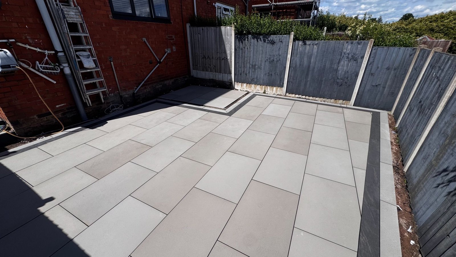 Transforming an Overgrown Garden into a Modern Porcelain Patio & Walkway image 11